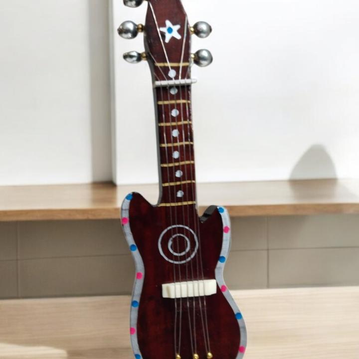 Artistic Miniature Guitar for Home Decor - Strings of Elegance